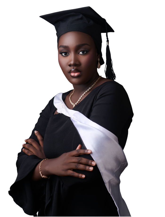 A graduate in cap and gown.